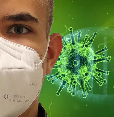 Mann mit FSSP Maske vor einem visualisierten Corona-Virus